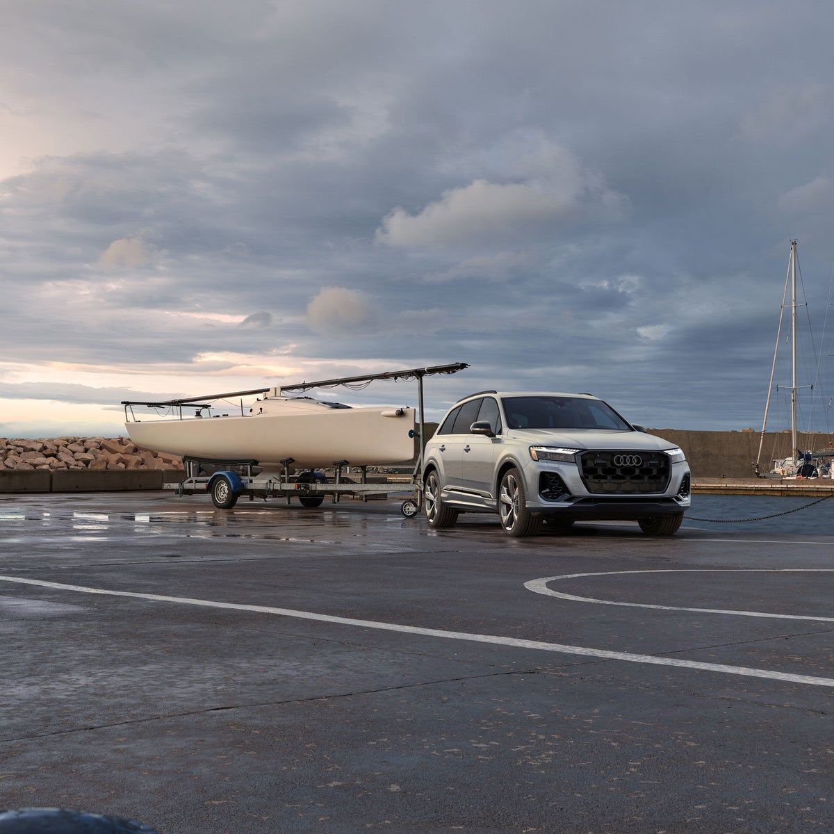 2026 Audi Q7 with a boat trailer, 7700 pound towing capacity