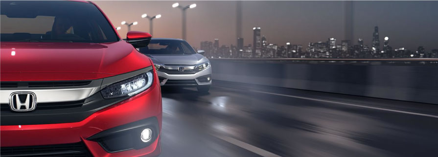 Red and silver 2017 Honda Civic racing