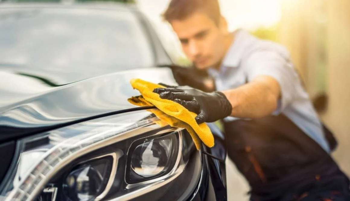 tech finishes applying the cermaplate treatment to a vehicle