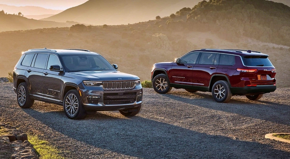 A grey 2024 Jeep Grand Cherokee and red Grand Cherokee L