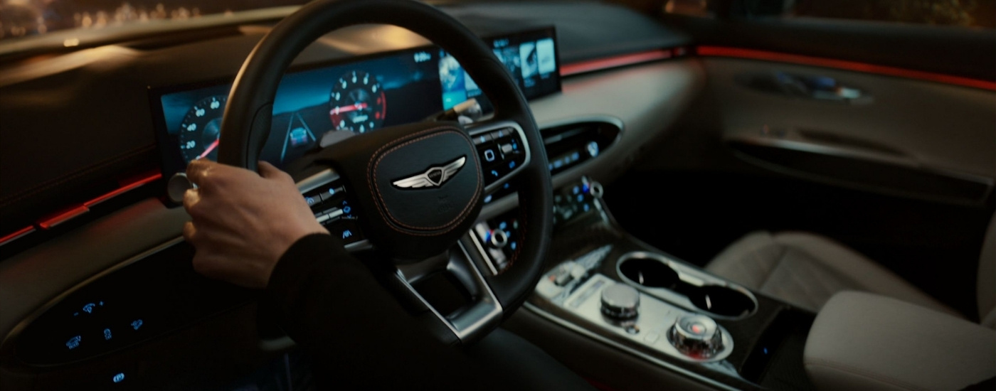 Close-up of a steering wheel on a 2025 Genesis GV70.
