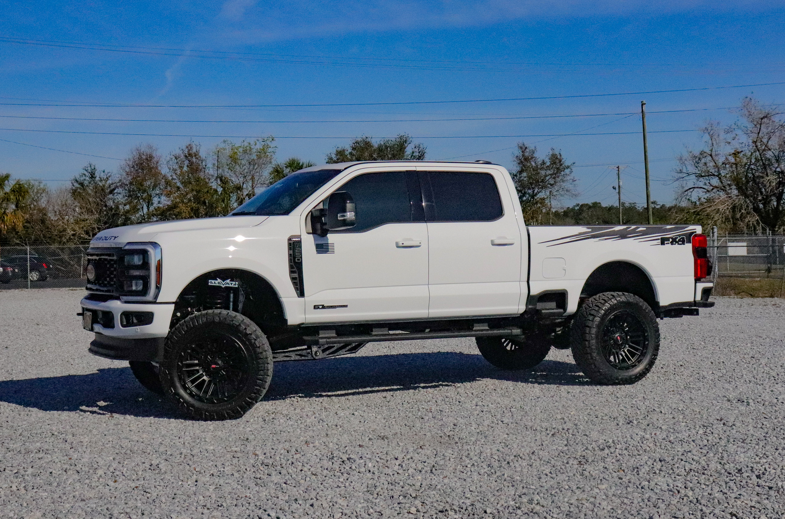 side view of a gray Ford Super Duty