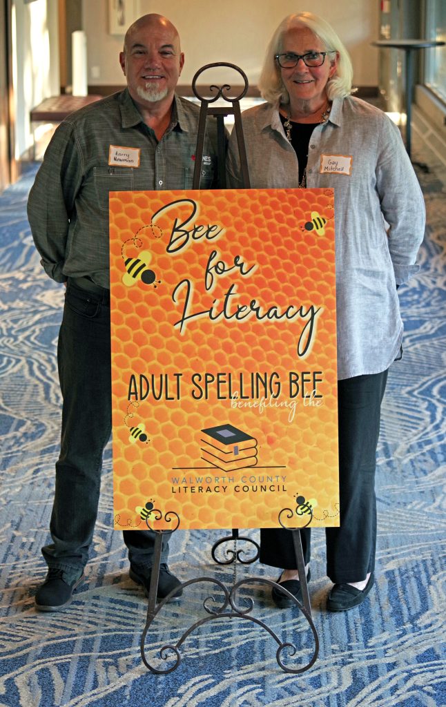 Kunes representatives Larry Newman and Gay Mitchell at the "Bee For Literacy" Adult Spelling Bee.