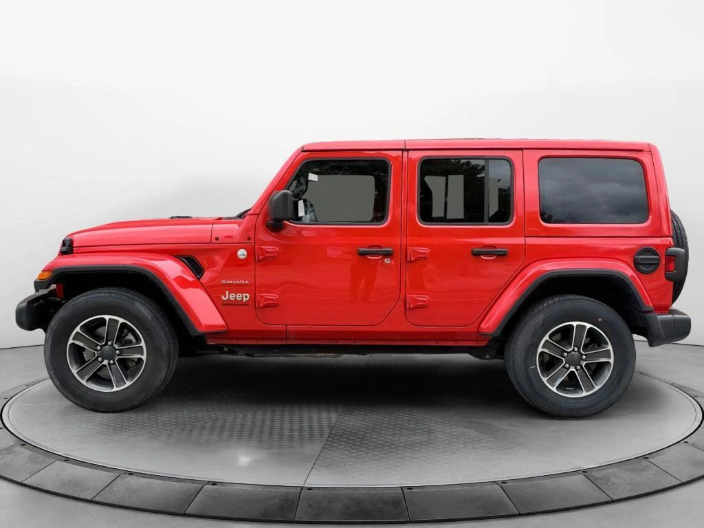 Used 2023 Jeep Wrangler 4-Door Sahara with VIN 1C4HJXENXPW586761 for sale in Kansas City