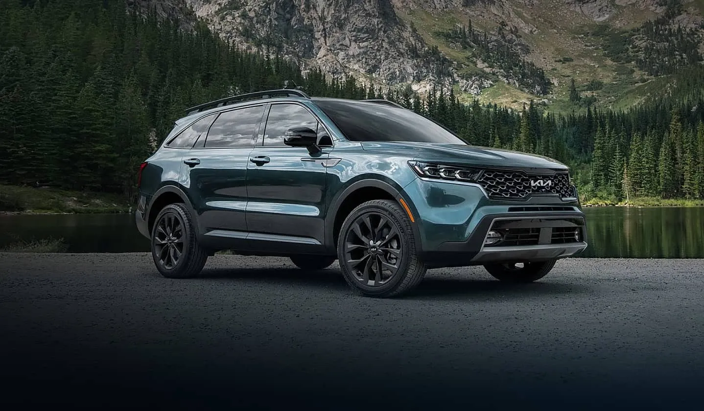 Teal Colored Kia SUV