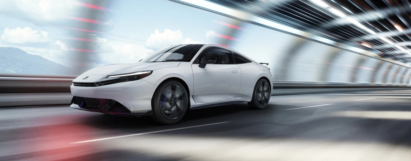 White 2026 Honda Prelude driving through a tunnel