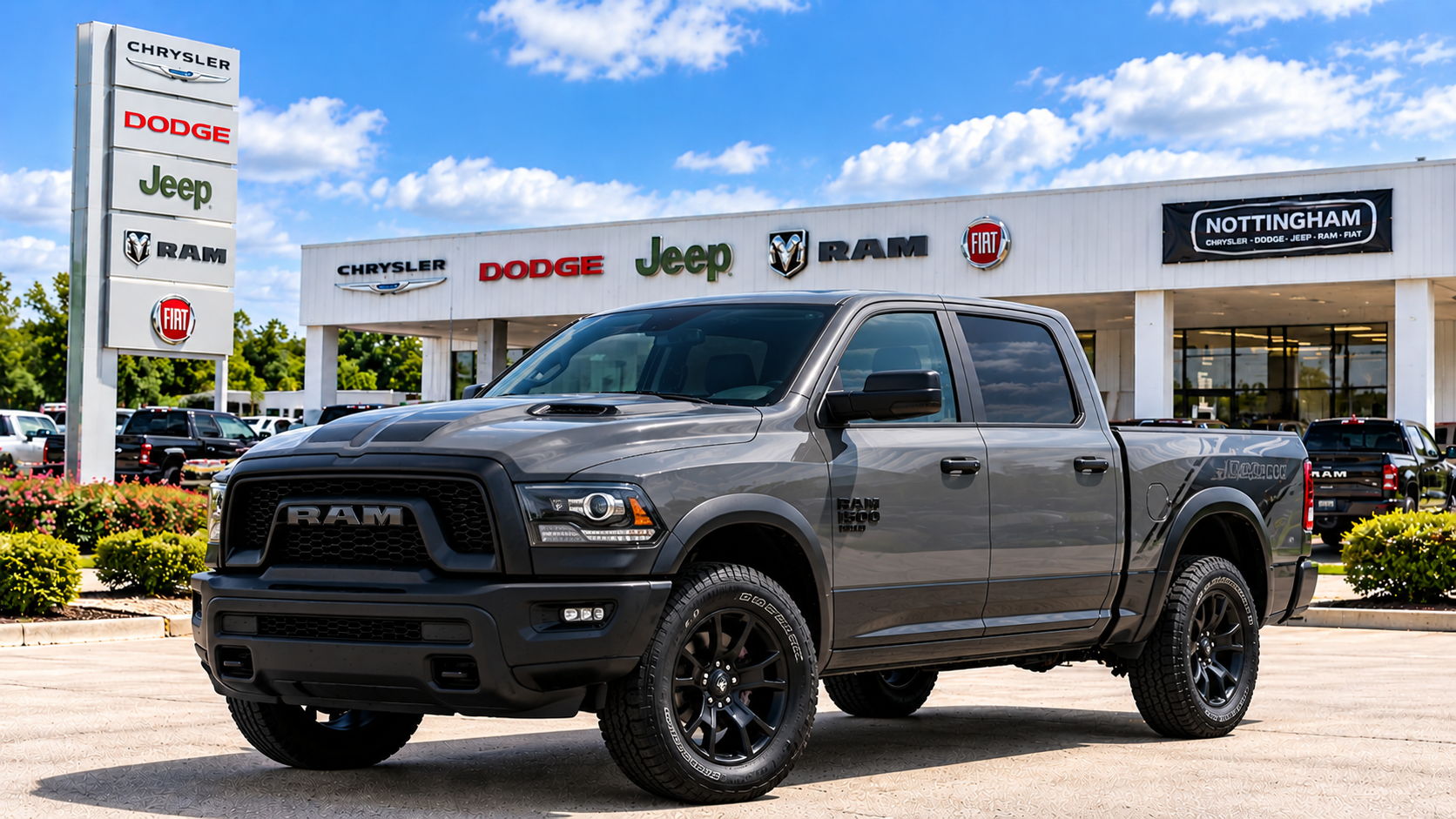Gray RAM 1500 Warlock pickup truck at Bonham Chrysler in Bonham, Texas