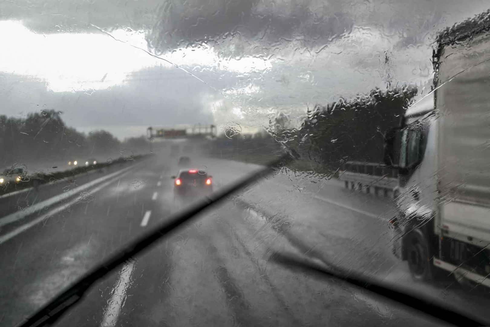 Ford F-150 windshield, driving in rainy conditions on road