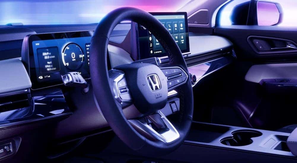 The gray interior and dash of a 2024 Honda Prologue is shown.