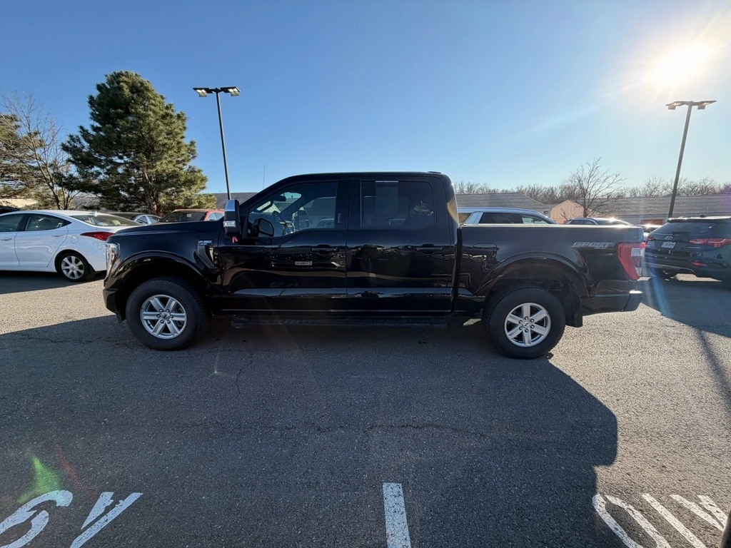 Used 2021 Ford F-150 Lariat with VIN 1FTFW1E88MKD28029 for sale in Kansas City