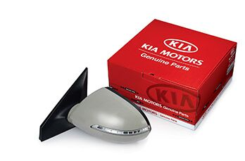 Kia Genuine Parts side mirror displayed next to its retail box