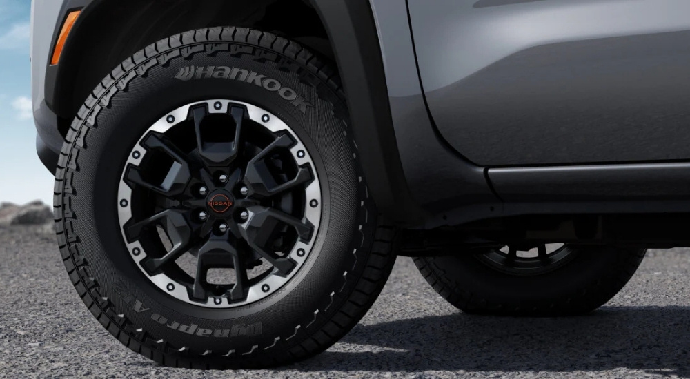 Wheel on a grey 2025 Nissan Frontier PRO-4X