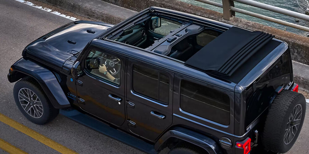 2024 Jeep Wrangler 4xe driving on a road