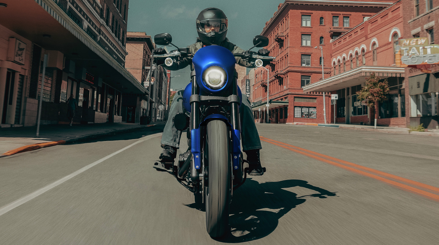 Blue 2026 Harley-Davidson® Low Rider® S driving through city