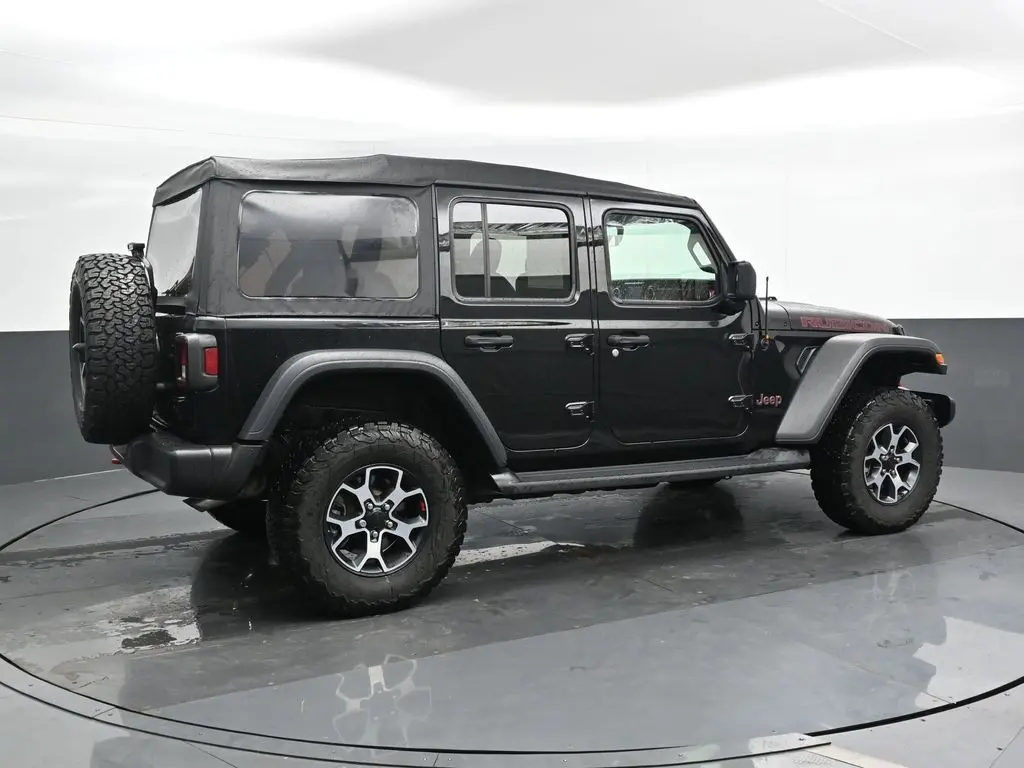 Used 2022 Jeep Wrangler Unlimited Rubicon with VIN 1C4HJXFG7NW127202 for sale in Sycamore, IL