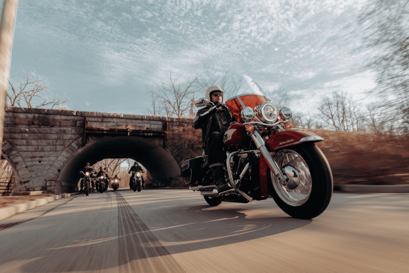 Several bikers riding Harley-Davidson® motorcycles