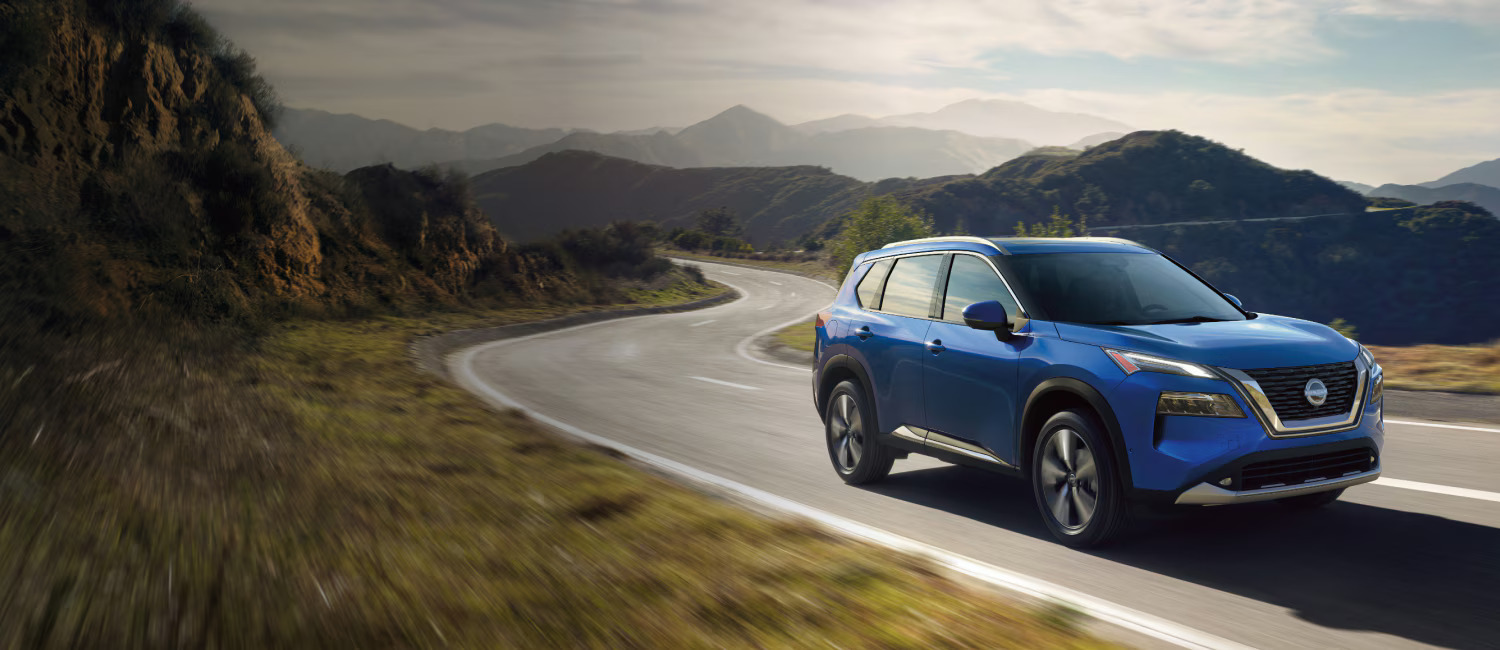 Pre-Owned Nissan Rogue Driving