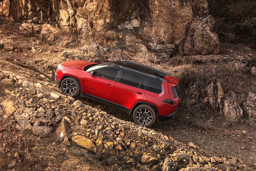 2026 Jeep Cherokee Exterior Driver Side Front Profile While Climbing on Off-Road Trail