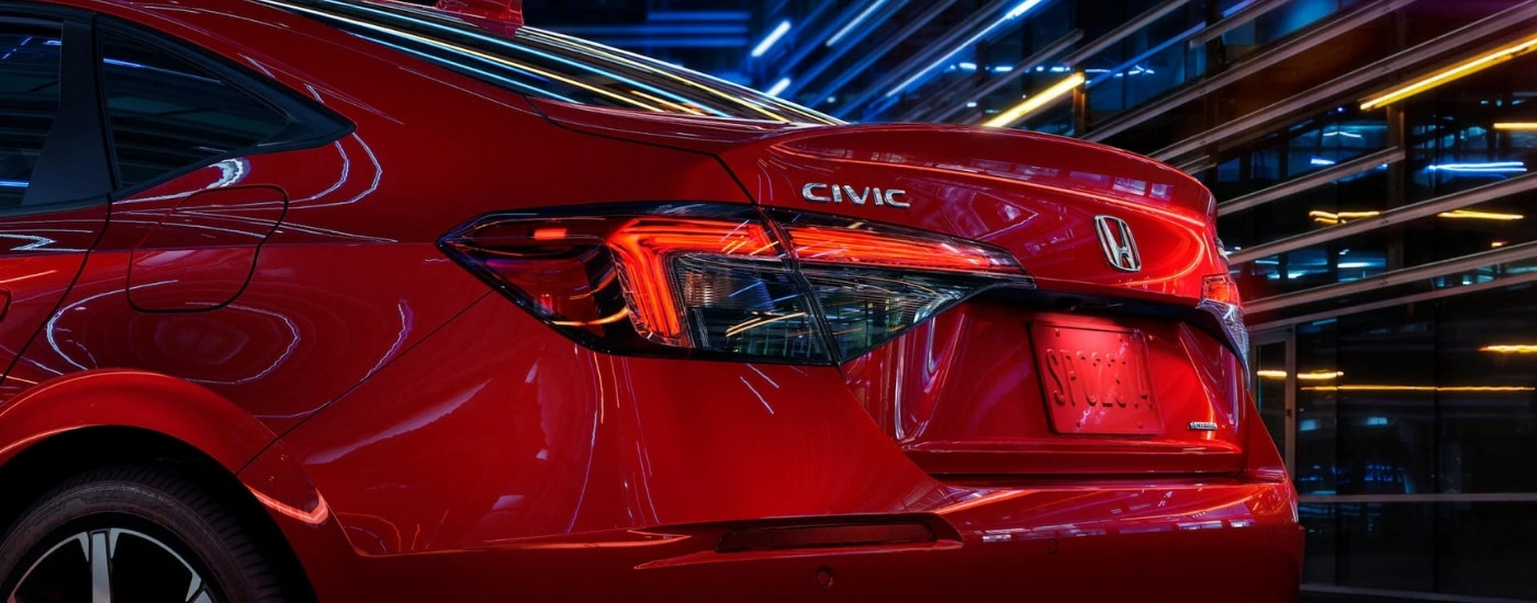 Rear end of a red 2025 Honda Civic Hybrid