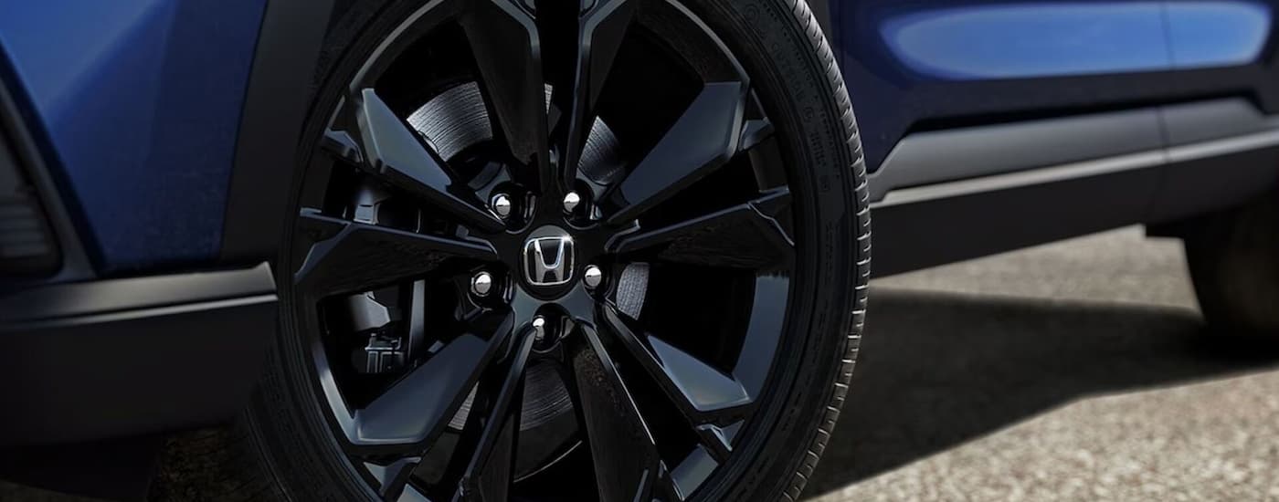 Black rim and tire on a 2025 Honda CR-V