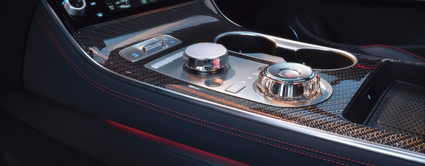 Carbon fiber center console in a 2027 Genesis GV70 Prestige Graphite