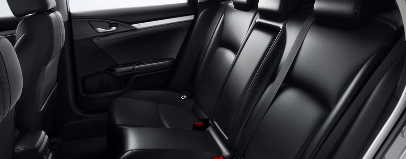 Rear black leather seats in a 2021 Honda Civic Touring