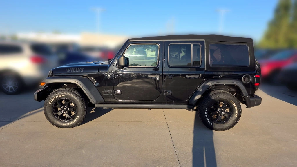 Used 2021 Jeep Wrangler Unlimited Willys with VIN 1C4HJXDG0MW750582 for sale in Kansas City