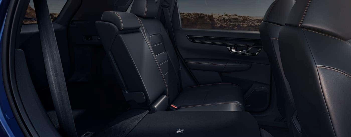 The black interior of a 2023 Honda CR-V is shown.