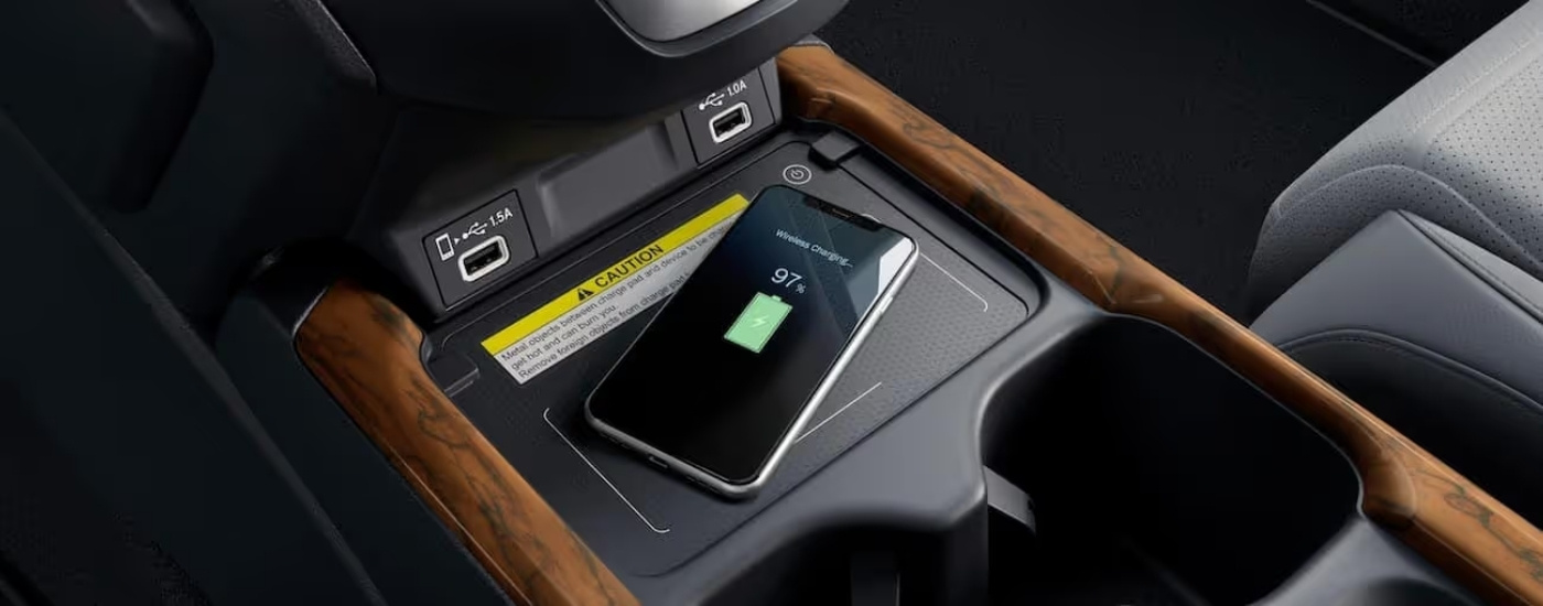 Phone wirelessly charging on the center console of a 2020 Honda CR-V Touring