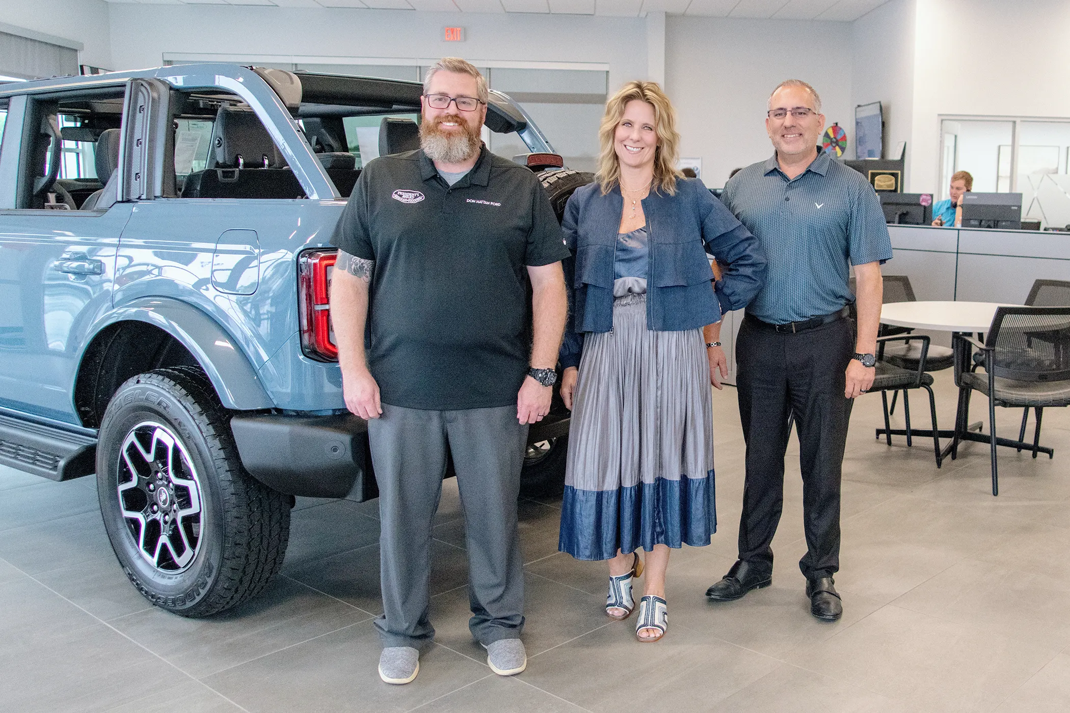 Jill Hattan with Jeremy the General Sales Manager and Kyle the Sales Manager at Don Hattan Ford of Augusta.