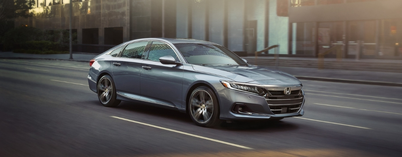 Grey 2021 Honda Accord Touring driving on a city street