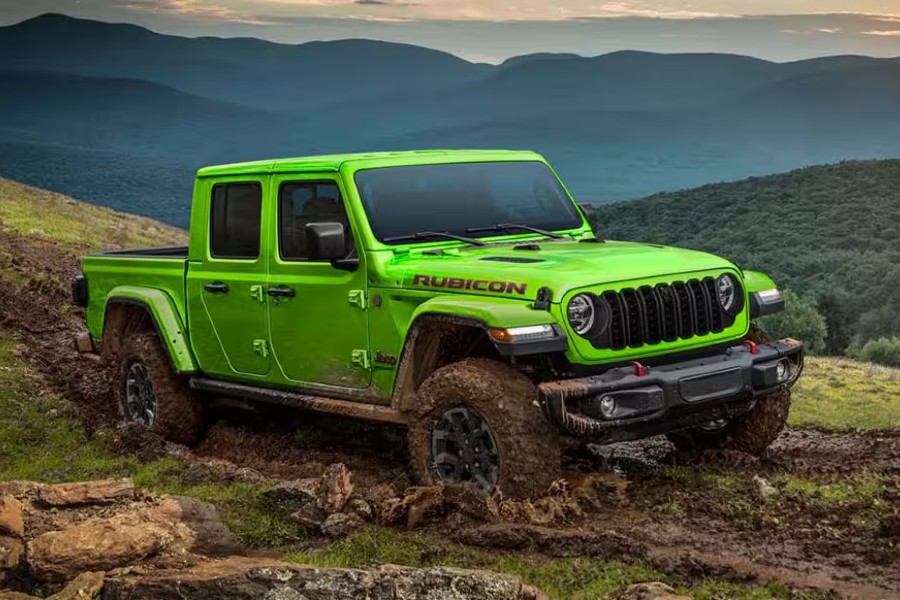 2026 Jeep Gladiator Exterior Passenger Side Front Profile while Mudding