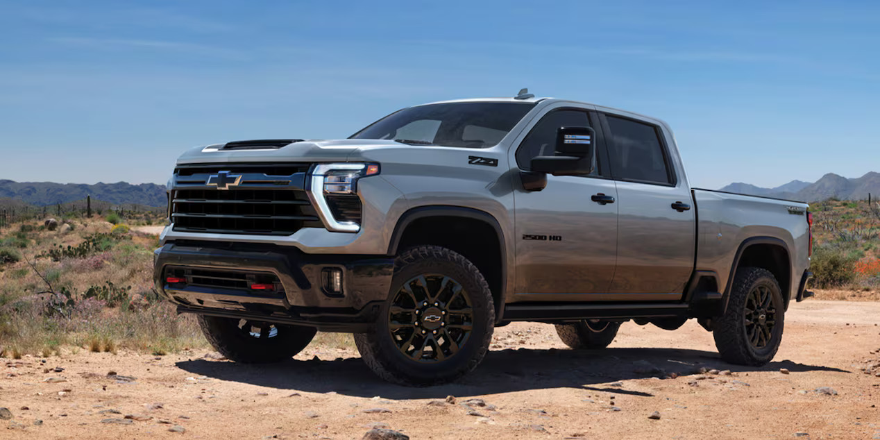 A gray 2500hd parked in the desert.