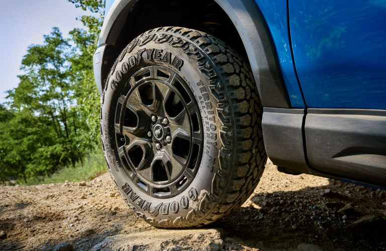 Close Up of 2025 Ford Bronco Sport Sasquatch Tires on Dirt Trail