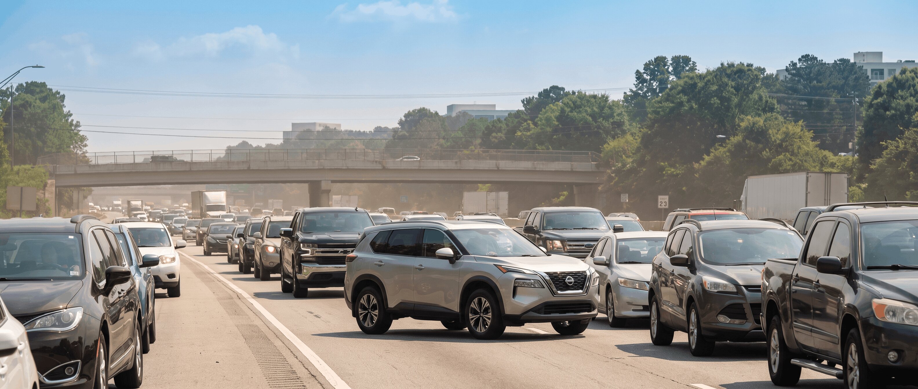 2026 Nissan Rogue in stop-and-go traffic on I-285 in the Atlanta metro area on a hot summer day