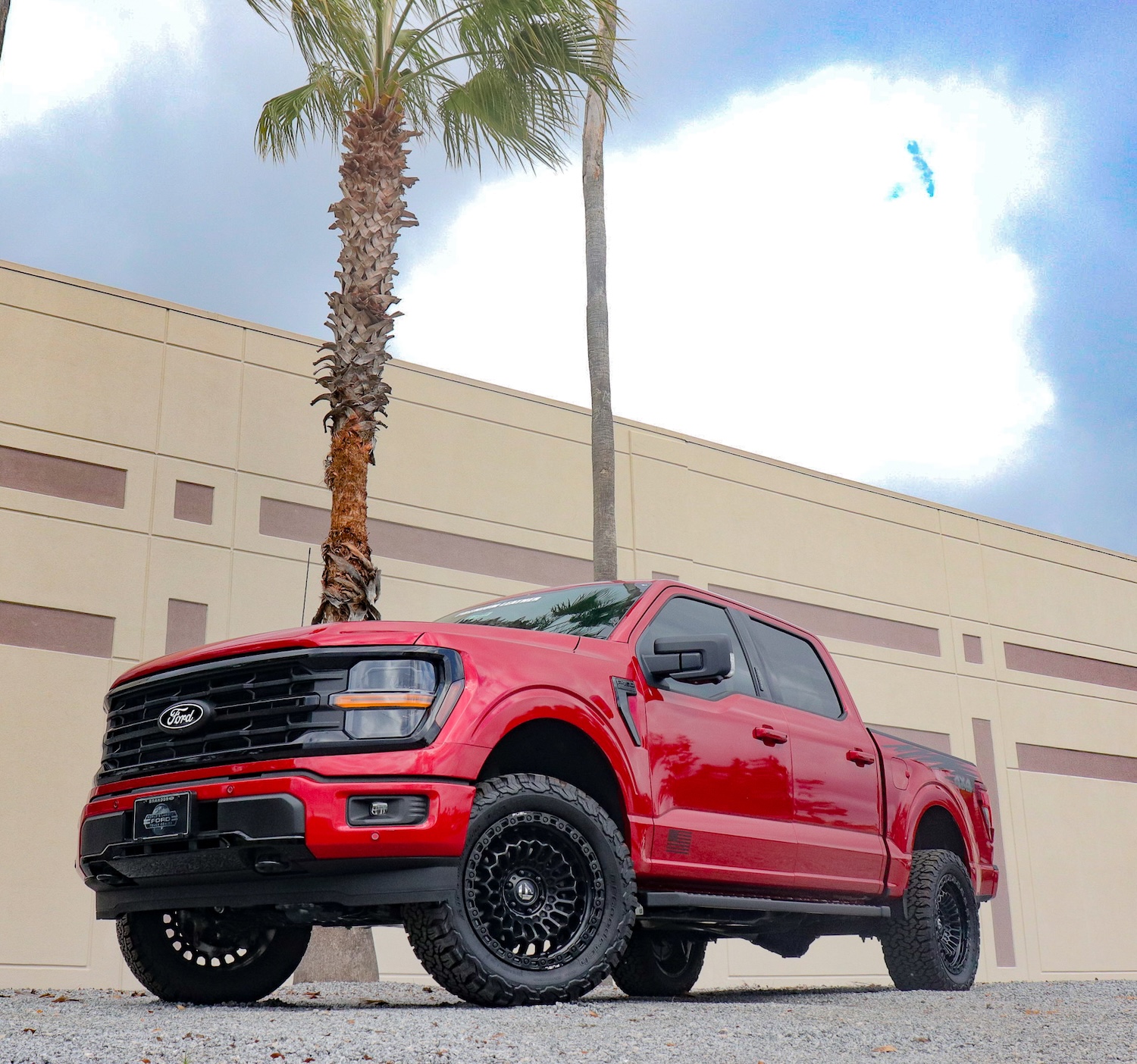 side view of a blue Ford Super Duty