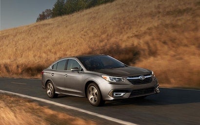 2022 Subaru Legacy driving on road.