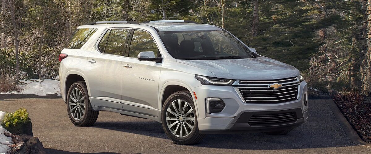 A silver 2023 Chevrolet Traverse parked. 