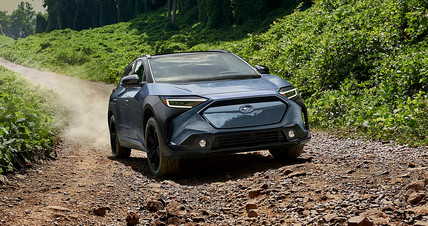A 2025 Solterra driving up a dirt road