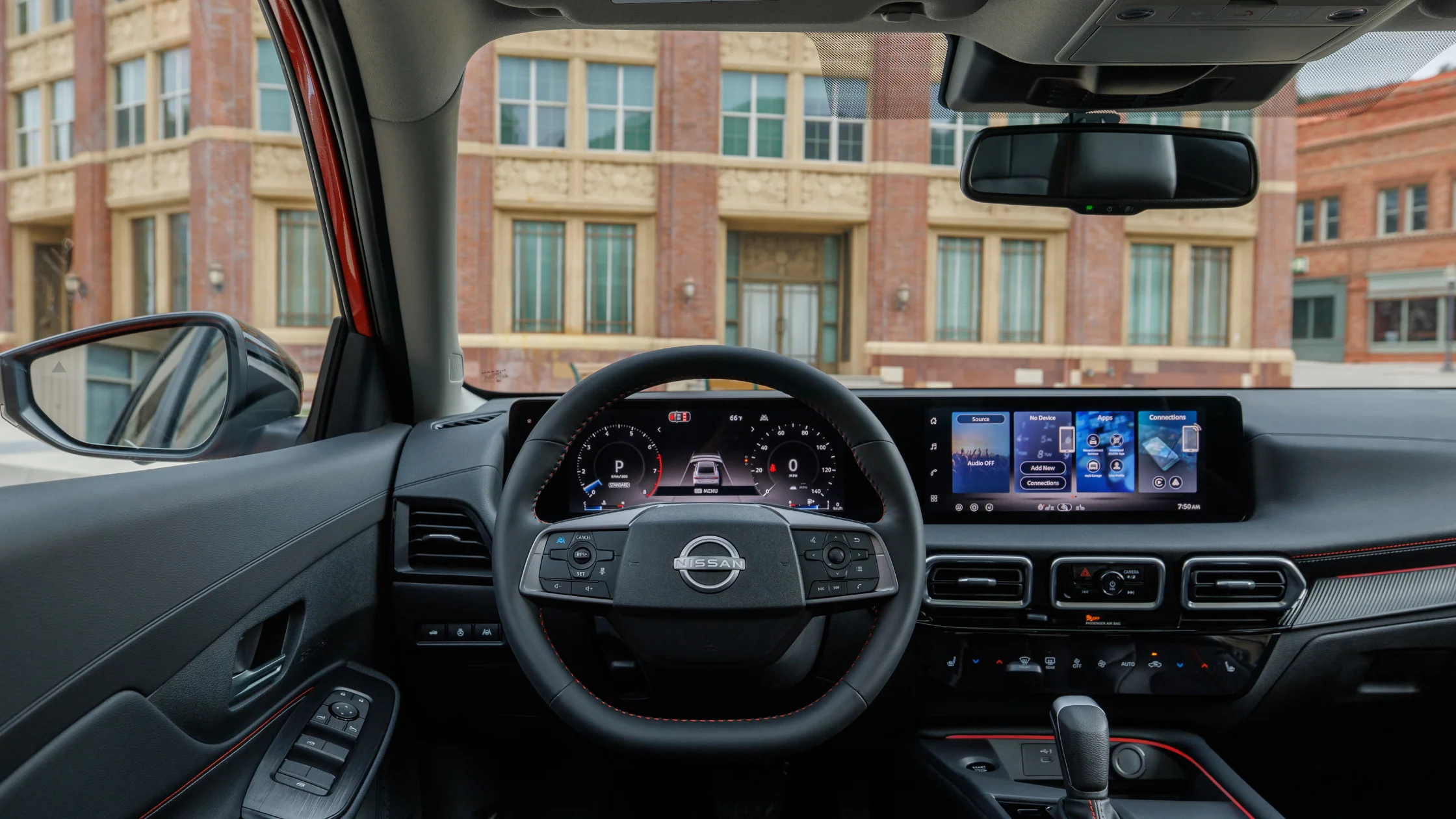 2025 Nissan Sentra® cockpit with digital gauges, touchscreen display, and black interior
