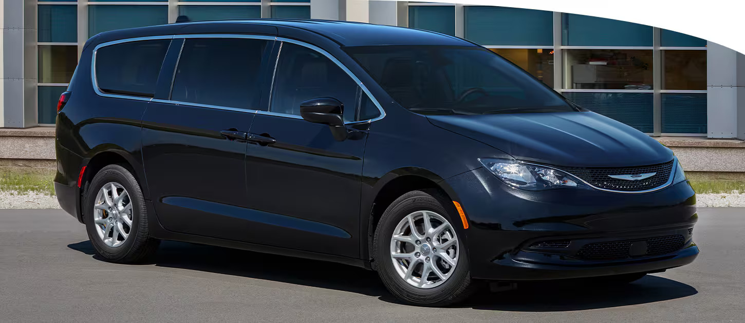 A black chrysler voyager.