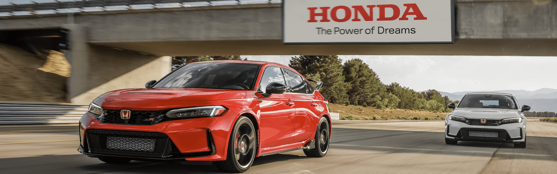2024 Honda Civic Type R running under a bridge