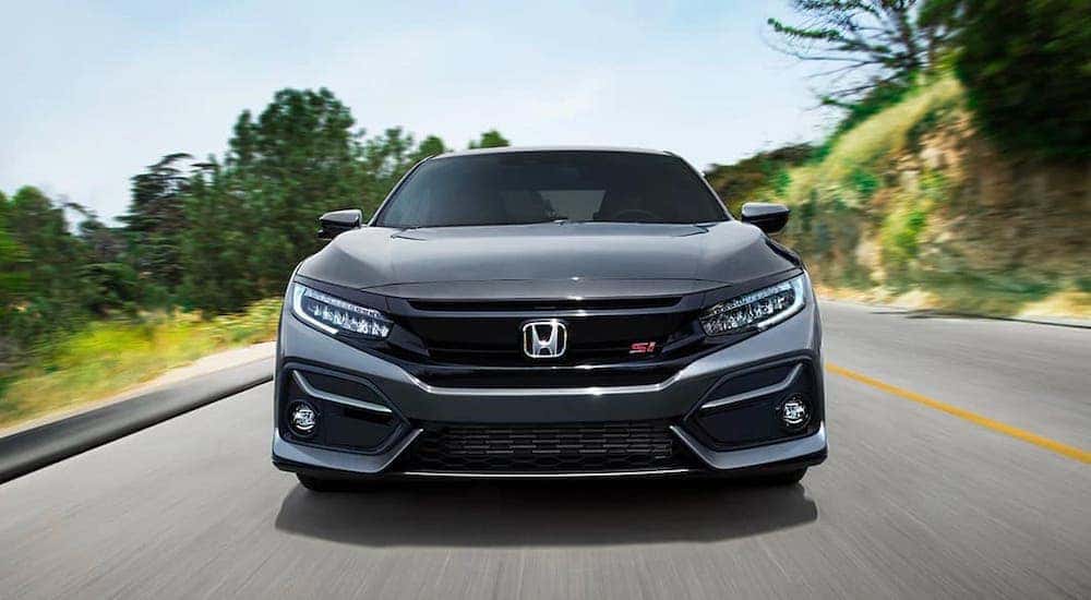 A gray 2021 Honda Civic Si is coming to a Honda dealer near you, shown here from the front.