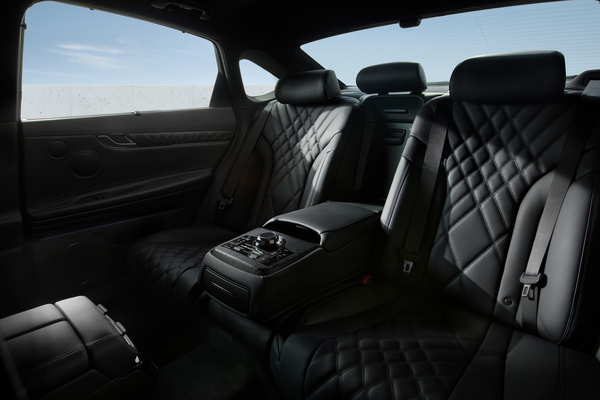 Interior pov of black nappa leather rear seating inside Genesis G80 Prestige Black