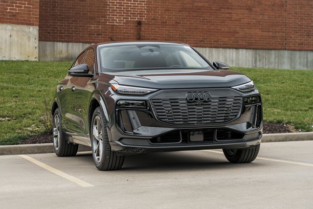2027 Audi Q6 Sportback e-tron in dark gray, front three-quarter view