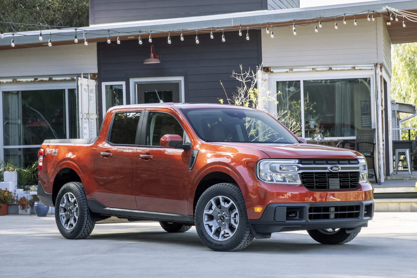 orange 2024 Ford Maverick parked in driveway