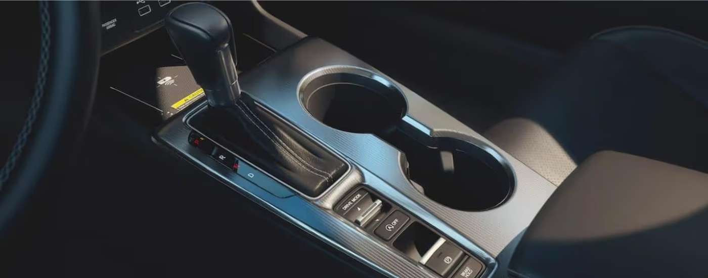 Center console and shifter are shown in a 2022 Honda Civic Touring
