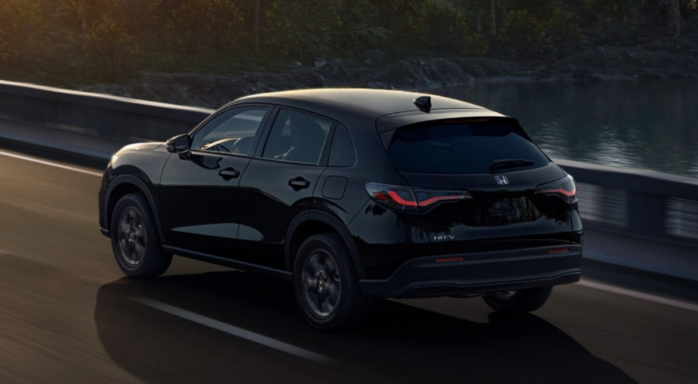 Black 2026 Honda HR-V EX-L driving over a bridge