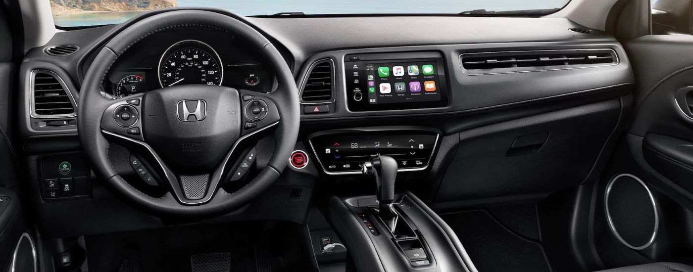 Black steering wheel and center console of a 2022 Honda HR-V