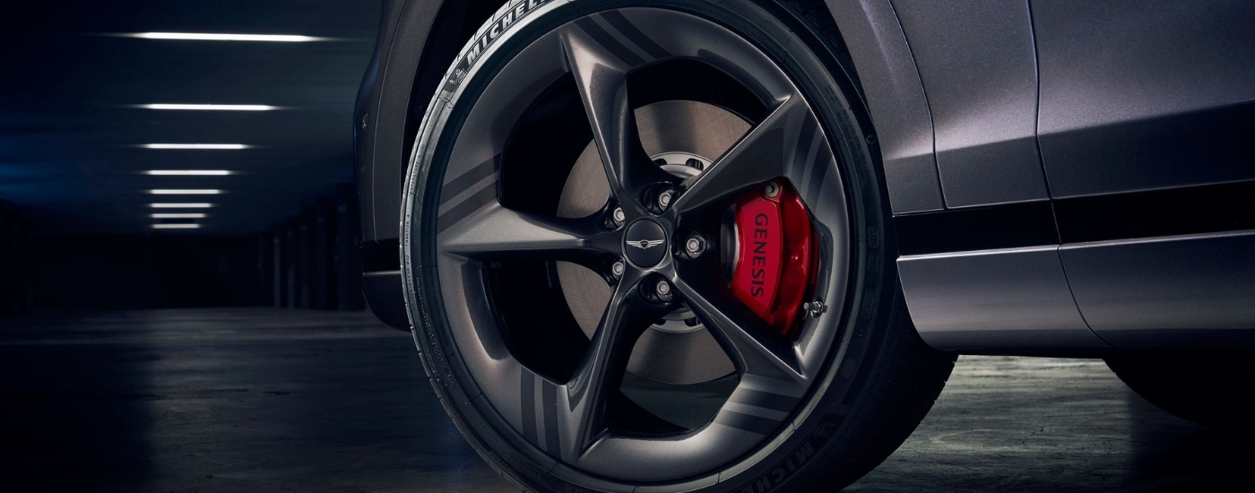 Black wheel on a grey 2026 Genesis GV70